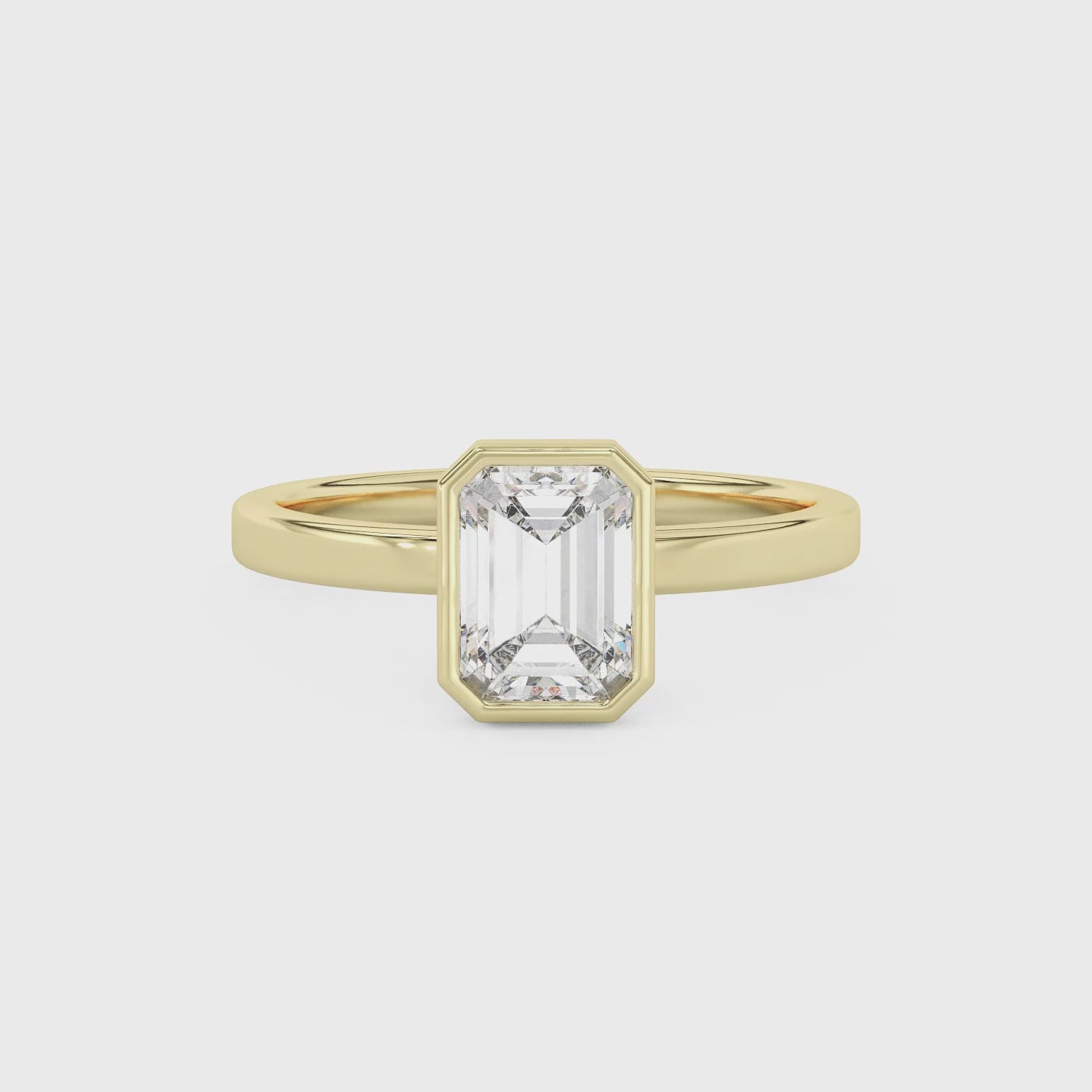 Betty Bezel Emerald Engagement Ring